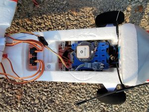 Flight controller installed in a fixed-wing airframe
