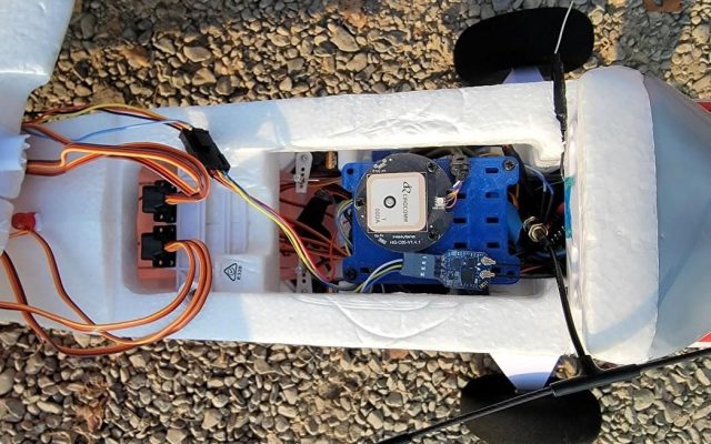 Flight controller installed in a fixed-wing airframe